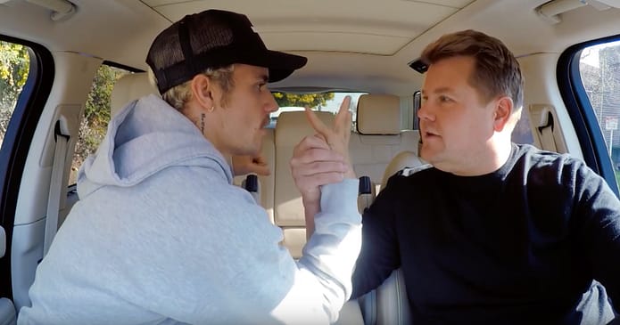 Justin Bieber and his mustache arm-wrestle James Corden in his return to Carpool Karaoke
