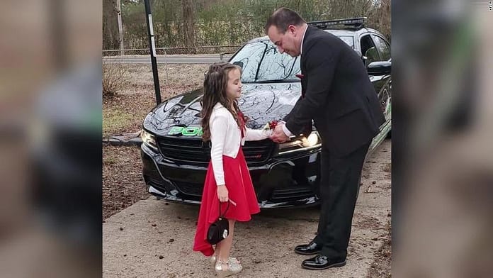 Officer takes girl without dad to father-daughter dance