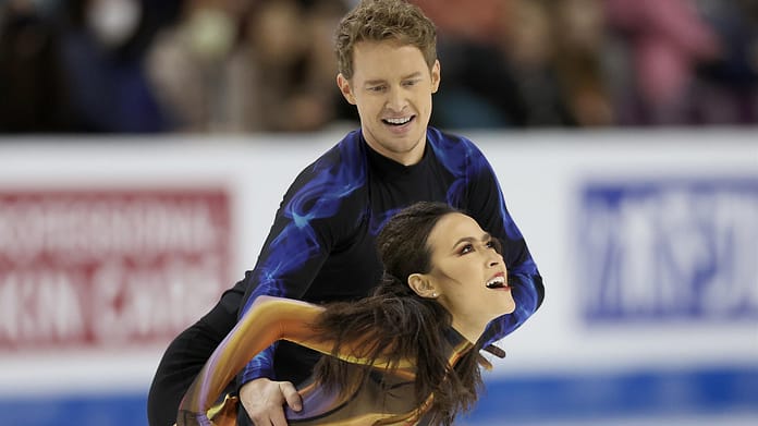 Chock and Bates win ice dance gold despite fall