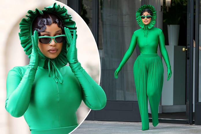 Cardi B goes green in Paris, rocks meme-worthy catsuit with frilly bonnet