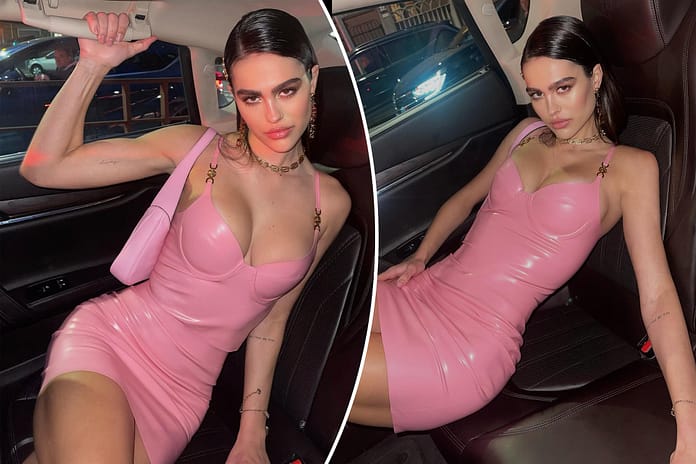 Amelia Gray Hamlin wows in pink latex Versace outfit