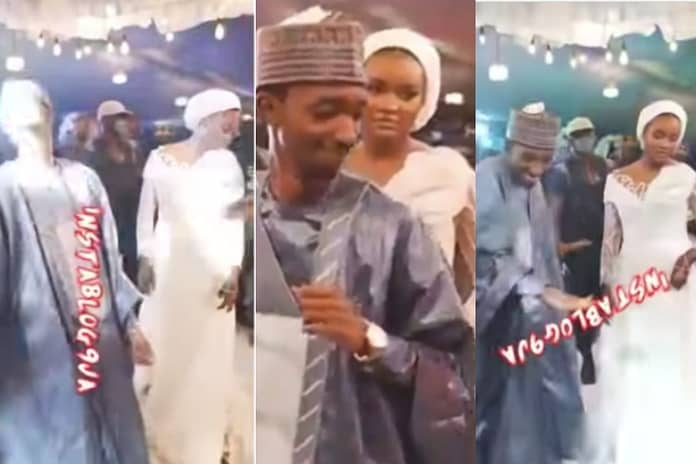 High-Spirited Groom Dances Vibrantly With Cool Dance Moves As Bride Stand Still, Nigerians React (VIDEO)